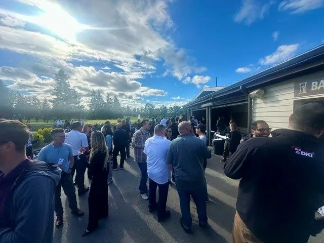 Members gathering on the patio at Lobster Fest